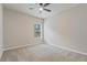 Comfortable bedroom with a ceiling fan and a window at 1537 Maplecliff Way, Sugar Hill, GA 30518