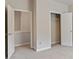 The bedroom boasts two closets and neutral colors, creating a functional and airy space at 1537 Maplecliff Way, Sugar Hill, GA 30518