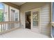 Cozy outdoor patio with a view of the interior and a sliding door at 1537 Maplecliff Way, Sugar Hill, GA 30518