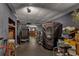 Basement featuring workout equipment, rubber floors, and storage area at 1772 Brittany Chase Nw, Kennesaw, GA 30152