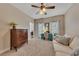 Comfortable living room features a couch, desk, and windows with natural light at 1772 Brittany Chase Nw, Kennesaw, GA 30152