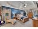 Large main bedroom boasts a tray ceiling, natural light, and accent wall at 1772 Brittany Chase Nw, Kennesaw, GA 30152