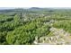 An aerial view of the community with a view of the mountains at 1450 Rainfall Ct, Cumming, GA 30040