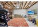 Finished basement with exposed ceiling, TV area, workout area and sectional sofa at 1450 Rainfall Ct, Cumming, GA 30040