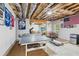Large basement featuring both TV and game areas, including a ping pong table at 1450 Rainfall Ct, Cumming, GA 30040