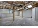 Unfinished basement with concrete walls, exposed ductwork, and wooden support beams at 23 Timberlake Pointe Ne, Cartersville, GA 30121