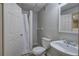 Small bathroom featuring a shower, toilet, and sink with white fixtures at 23 Timberlake Pointe Ne, Cartersville, GA 30121