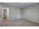 Bedroom featuring neutral walls and plush carpeting and adjacent hallway at 23 Timberlake Pointe Ne, Cartersville, GA 30121
