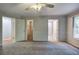 Bedroom with plush carpeting and access to walk-in closet, hallway, and bathroom at 23 Timberlake Pointe Ne, Cartersville, GA 30121
