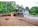 Exterior of a home with a spacious wooden deck and a fenced backyard at 23 Timberlake Pointe Ne, Cartersville, GA 30121