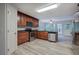 Updated kitchen featuring stainless appliances, granite counters and updated flooring at 23 Timberlake Pointe Ne, Cartersville, GA 30121