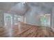 Spacious living room features hardwood floors, vaulted ceilings, and an open layout at 23 Timberlake Pointe Ne, Cartersville, GA 30121