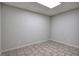 This room is empty and freshly painted, showcasing tile flooring and electrical outlets at 23 Timberlake Pointe Ne, Cartersville, GA 30121