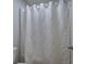 Close-up of shower with a white shower curtain at 23 Timberlake Pointe Ne, Cartersville, GA 30121