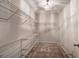 Walk-in closet featuring carpeted floor and wire rack shelves at 23 Timberlake Pointe Ne, Cartersville, GA 30121