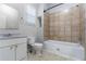 Standard bathroom featuring a vanity, toilet and shower/tub with tile surround at 3361 Myrtle St, Atlanta, GA 30354