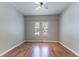 Empty bedroom showing updated flooring and ceiling fan at 3361 Myrtle St, Atlanta, GA 30354