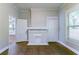Cozy living room featuring a fireplace, a window, and freshly painted walls at 3361 Myrtle St, Atlanta, GA 30354
