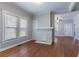 Living room with hardwood floors, fireplace, and a large window for natural light at 3361 Myrtle St, Atlanta, GA 30354