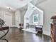 Inviting bonus room with hardwood floors, a window seat, and stylish decor at 5039 Towne Lake Hills North, Woodstock, GA 30189