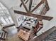 Top-down view showcasing the living room with a stone fireplace and open floor plan at 5039 Towne Lake Hills North, Woodstock, GA 30189