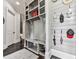 Welcoming mudroom with custom built-ins, seating, and stylish storage solutions at 5039 Towne Lake Hills North, Woodstock, GA 30189