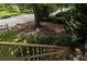 A landscape view from the deck stairs showcases a small table and chairs to sit at 520 Park Se Ave # 2, Atlanta, GA 30312