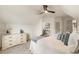 Bright bedroom offers vaulted ceilings, ample natural light, and a neutral color palette at 5860 Fairway View Dr, Suwanee, GA 30024
