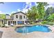 Beautiful backyard featuring a large in-ground pool and patio area at 125 Foxridge Rd, Atlanta, GA 30327