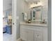 Well-lit bathroom vanity with modern fixtures and stylish shiplap wall at 125 Foxridge Rd, Atlanta, GA 30327