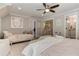 Spacious bedroom with soft daybed, seating and view into connecting room at 125 Foxridge Rd, Atlanta, GA 30327