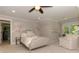 Charming bedroom with soft decor, chair and side table at 125 Foxridge Rd, Atlanta, GA 30327