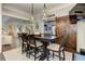 Charming dining room with a rustic table set, decorative lighting, and elegant barn door at 125 Foxridge Rd, Atlanta, GA 30327