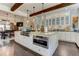 Bright kitchen with an island, stainless steel appliances, and a view into the dining area at 125 Foxridge Rd, Atlanta, GA 30327