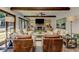 Well-lit living room with a stone fireplace, wood beams and lots of natural light at 125 Foxridge Rd, Atlanta, GA 30327