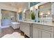 Elegant bathroom boasts double vanity sinks and luxurious walk-in shower at 125 Foxridge Rd, Atlanta, GA 30327