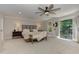 Spacious main bedroom with a ceiling fan and access to a private balcony at 125 Foxridge Rd, Atlanta, GA 30327