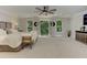 Open main bedroom leading to a private balcony, with neutral colors and modern decor at 125 Foxridge Rd, Atlanta, GA 30327