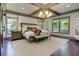 Bright and airy main bedroom boasts tray ceiling and large windows at 125 Foxridge Rd, Atlanta, GA 30327