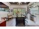 Stylish home office featuring custom built-ins, hardwood floors, and ample natural light at 125 Foxridge Rd, Atlanta, GA 30327