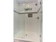 Close up of all-tile shower with glass surround and modern fixtures at 125 Foxridge Rd, Atlanta, GA 30327