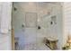 Spacious walk-in shower with dual shower heads and stylish pebble flooring at 125 Foxridge Rd, Atlanta, GA 30327
