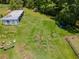Expansive property featuring a large yard, garden, and shed for storage at 3769 Bay Creek Church Rd, Loganville, GA 30052