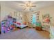 Charming bedroom with a dollhouse, toys, and natural light, perfect for a imaginative world at 3769 Bay Creek Church Rd, Loganville, GA 30052