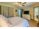 Comfortable bedroom with ceiling fan, neutral paint, and white dresser, creating a relaxing retreat at 3769 Bay Creek Church Rd, Loganville, GA 30052