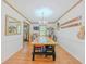 Formal dining room with a long wooden table and views into adjacent rooms at 3769 Bay Creek Church Rd, Loganville, GA 30052