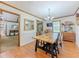 Charming dining area featuring a rustic table, chandelier, and stylish decor at 3769 Bay Creek Church Rd, Loganville, GA 30052