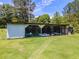 A large open storage shed and grassy field at 3769 Bay Creek Church Rd, Loganville, GA 30052