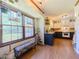 Bright kitchen area featuring stainless steel appliances, bench seating and natural light at 3769 Bay Creek Church Rd, Loganville, GA 30052