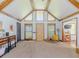 Inviting living room with a vaulted ceiling and lots of natural light at 3769 Bay Creek Church Rd, Loganville, GA 30052